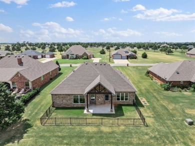 Gorgeous home located on the 15th hole of Cimarron National Golf on Cimarron National Golf Club in Oklahoma - for sale on GolfHomes.com, golf home, golf lot