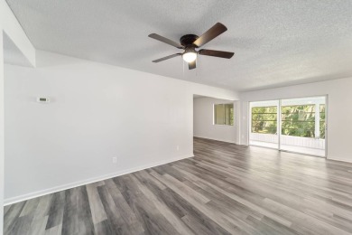 Seller to pay ONE FULL YEAR OF CONDO FEES on this freshly on Country Club At Silver Springs Shores in Florida - for sale on GolfHomes.com, golf home, golf lot