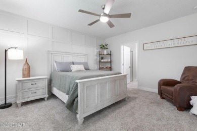 Welcome to 118 Pitching Wedge Drive, a stunning 2023-built home on LPGA International Golf Course in Florida - for sale on GolfHomes.com, golf home, golf lot