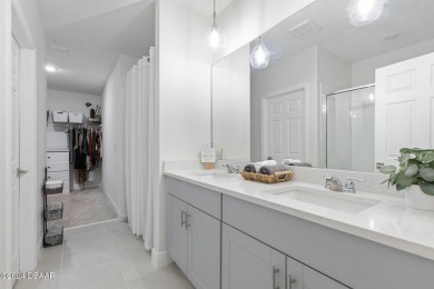 Welcome to 118 Pitching Wedge Drive, a stunning 2023-built home on LPGA International Golf Course in Florida - for sale on GolfHomes.com, golf home, golf lot
