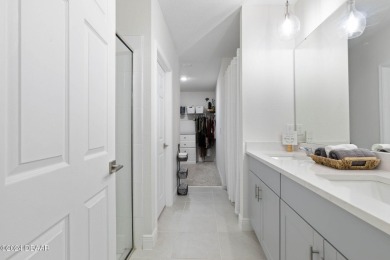 Welcome to 118 Pitching Wedge Drive, a stunning 2023-built home on LPGA International Golf Course in Florida - for sale on GolfHomes.com, golf home, golf lot