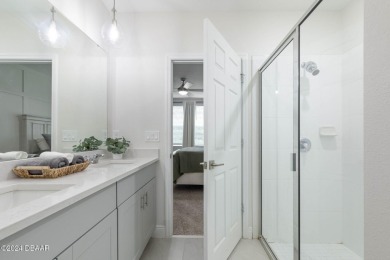 Welcome to 118 Pitching Wedge Drive, a stunning 2023-built home on LPGA International Golf Course in Florida - for sale on GolfHomes.com, golf home, golf lot