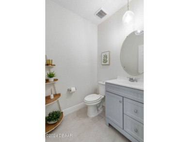 Welcome to 118 Pitching Wedge Drive, a stunning 2023-built home on LPGA International Golf Course in Florida - for sale on GolfHomes.com, golf home, golf lot