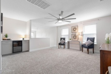 Welcome to 118 Pitching Wedge Drive, a stunning 2023-built home on LPGA International Golf Course in Florida - for sale on GolfHomes.com, golf home, golf lot