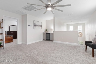 Welcome to 118 Pitching Wedge Drive, a stunning 2023-built home on LPGA International Golf Course in Florida - for sale on GolfHomes.com, golf home, golf lot