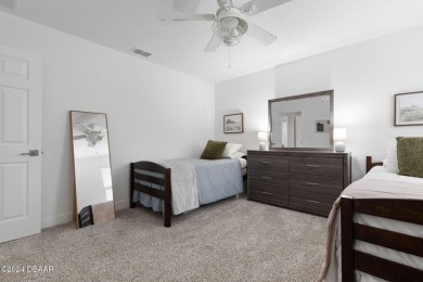 Welcome to 118 Pitching Wedge Drive, a stunning 2023-built home on LPGA International Golf Course in Florida - for sale on GolfHomes.com, golf home, golf lot