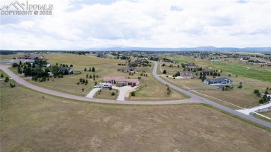 Nestled within the exclusive Kings Deer Highlands of Monument on Kings Deer Golf Club in Colorado - for sale on GolfHomes.com, golf home, golf lot