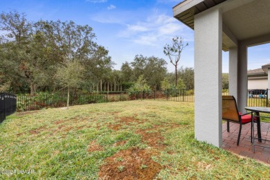 Welcome to 118 Pitching Wedge Drive, a stunning 2023-built home on LPGA International Golf Course in Florida - for sale on GolfHomes.com, golf home, golf lot