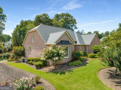 Nestled within the prestigious Polo Golf & Country Club on Polo Golf and Country Club in Georgia - for sale on GolfHomes.com, golf home, golf lot