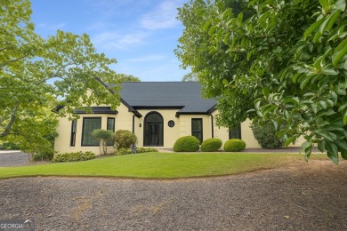 Nestled within the prestigious Polo Golf & Country Club on Polo Golf and Country Club in Georgia - for sale on GolfHomes.com, golf home, golf lot