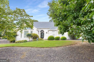 Nestled within the prestigious Polo Golf & Country Club on Polo Golf and Country Club in Georgia - for sale on GolfHomes.com, golf home, golf lot