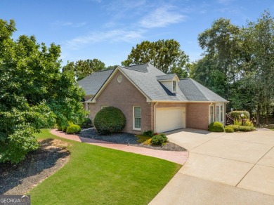 Nestled within the prestigious Polo Golf & Country Club on Polo Golf and Country Club in Georgia - for sale on GolfHomes.com, golf home, golf lot