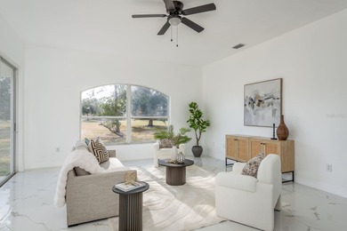 Welcome to this beautifully updated four-bedroom on Lexington Oaks Golf Club in Florida - for sale on GolfHomes.com, golf home, golf lot