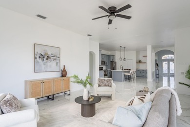 Welcome to this beautifully updated four-bedroom on Lexington Oaks Golf Club in Florida - for sale on GolfHomes.com, golf home, golf lot