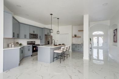 Welcome to this beautifully updated four-bedroom on Lexington Oaks Golf Club in Florida - for sale on GolfHomes.com, golf home, golf lot