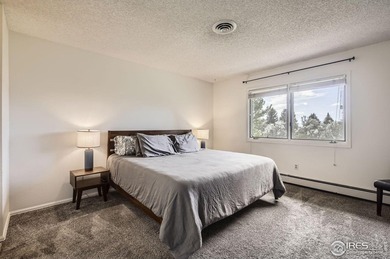 Welcome to this charming end-unit tucked away in desirable on Adriel Hills Golf Course in Colorado - for sale on GolfHomes.com, golf home, golf lot