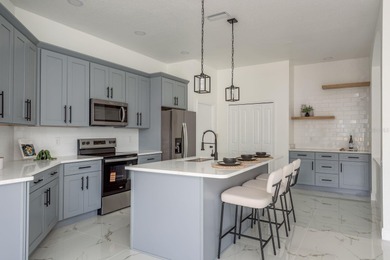 Welcome to this beautifully updated four-bedroom on Lexington Oaks Golf Club in Florida - for sale on GolfHomes.com, golf home, golf lot