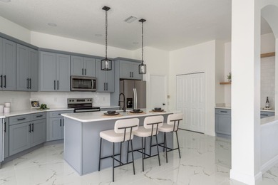 Welcome to this beautifully updated four-bedroom on Lexington Oaks Golf Club in Florida - for sale on GolfHomes.com, golf home, golf lot