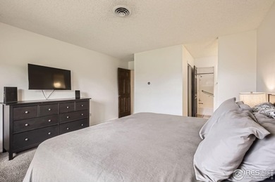 Welcome to this charming end-unit tucked away in desirable on Adriel Hills Golf Course in Colorado - for sale on GolfHomes.com, golf home, golf lot