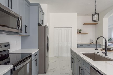 Welcome to this beautifully updated four-bedroom on Lexington Oaks Golf Club in Florida - for sale on GolfHomes.com, golf home, golf lot