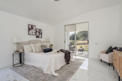 Welcome to this beautifully updated four-bedroom on Lexington Oaks Golf Club in Florida - for sale on GolfHomes.com, golf home, golf lot