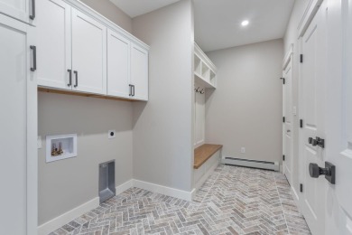 This beautifully appointed custom ranch is now complete and on Dunegrass Golf Club in Maine - for sale on GolfHomes.com, golf home, golf lot