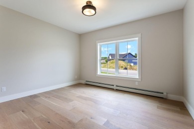 This beautifully appointed custom ranch is now complete and on Dunegrass Golf Club in Maine - for sale on GolfHomes.com, golf home, golf lot