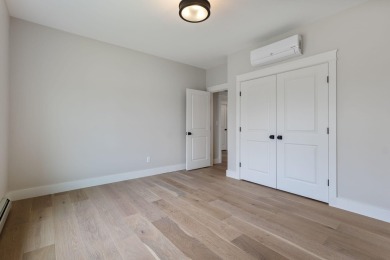 This beautifully appointed custom ranch is now complete and on Dunegrass Golf Club in Maine - for sale on GolfHomes.com, golf home, golf lot