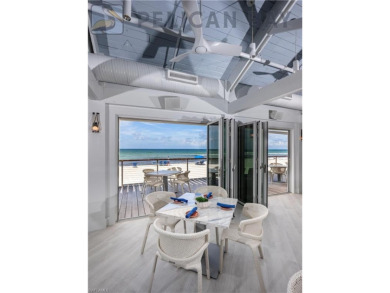 This beautifully renovated and sun-drenched 2-bedroom + den, 2 on Club at Pelican Bay Golf Course in Florida - for sale on GolfHomes.com, golf home, golf lot