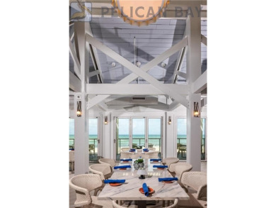 This beautifully renovated and sun-drenched 2-bedroom + den, 2 on Club at Pelican Bay Golf Course in Florida - for sale on GolfHomes.com, golf home, golf lot