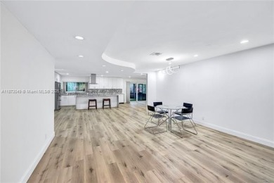 Nestled on a spectacular, tree-lined site in a quiet, low on Orangebrook Golf and Country Club in Florida - for sale on GolfHomes.com, golf home, golf lot