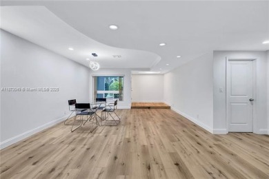 Nestled on a spectacular, tree-lined site in a quiet, low on Orangebrook Golf and Country Club in Florida - for sale on GolfHomes.com, golf home, golf lot