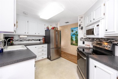 Double Wide Manufactured Home available in Largo, FL - Active on Palm Hill Golf Club in Florida - for sale on GolfHomes.com, golf home, golf lot