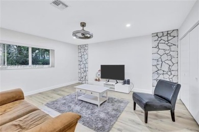 Nestled on a spectacular, tree-lined site in a quiet, low on Orangebrook Golf and Country Club in Florida - for sale on GolfHomes.com, golf home, golf lot