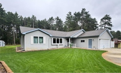 Discover the charm of this enchanting country home in Park on Headwaters Country Club in Minnesota - for sale on GolfHomes.com, golf home, golf lot