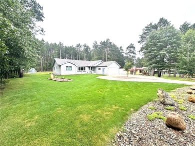 Discover the charm of this enchanting country home in Park on Headwaters Country Club in Minnesota - for sale on GolfHomes.com, golf home, golf lot