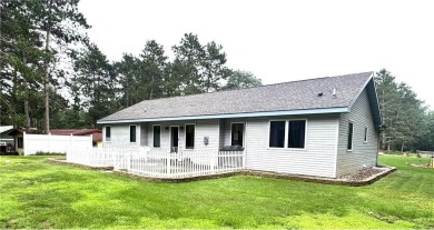 Discover the charm of this enchanting country home in Park on Headwaters Country Club in Minnesota - for sale on GolfHomes.com, golf home, golf lot