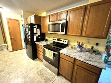 Discover the charm of this enchanting country home in Park on Headwaters Country Club in Minnesota - for sale on GolfHomes.com, golf home, golf lot