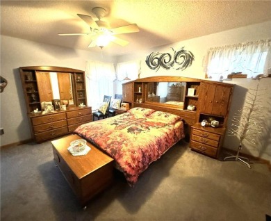 Discover the charm of this enchanting country home in Park on Headwaters Country Club in Minnesota - for sale on GolfHomes.com, golf home, golf lot