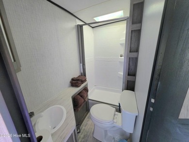 Welcome to 91 Carolina Street, North Topsail Beach -- your on North Shore Country Club in North Carolina - for sale on GolfHomes.com, golf home, golf lot