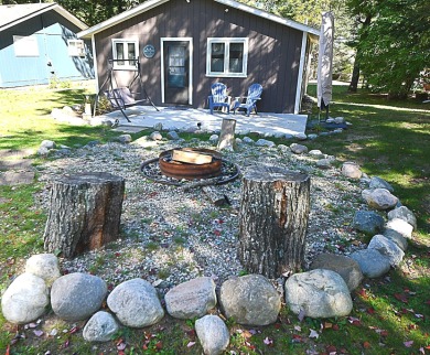 Enjoy up north living at its best in this highly sought after on Birch Pointe Golf Club in Michigan - for sale on GolfHomes.com, golf home, golf lot