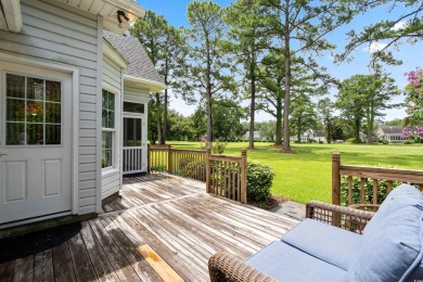 Nestled within a prestigious golf community, this immaculate on Wedgefield Plantation Golf Club in South Carolina - for sale on GolfHomes.com, golf home, golf lot