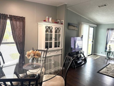 STEP INTO THIS BEAUTIFULLY UPDATED 2-BEDROOM 2-BATHROOM HOME! on Anglers Green Golf Course in Florida - for sale on GolfHomes.com, golf home, golf lot