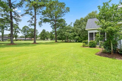 Nestled within a prestigious golf community, this immaculate on Wedgefield Plantation Golf Club in South Carolina - for sale on GolfHomes.com, golf home, golf lot