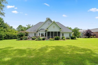 Nestled within a prestigious golf community, this immaculate on Wedgefield Plantation Golf Club in South Carolina - for sale on GolfHomes.com, golf home, golf lot