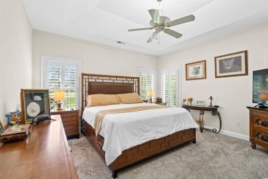 Nestled within a prestigious golf community, this immaculate on Wedgefield Plantation Golf Club in South Carolina - for sale on GolfHomes.com, golf home, golf lot