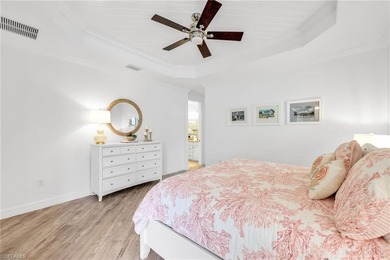 Welcome to elegant coastal living in sought after Fiddler's on The Golf Club At Fiddlers Creek in Florida - for sale on GolfHomes.com, golf home, golf lot