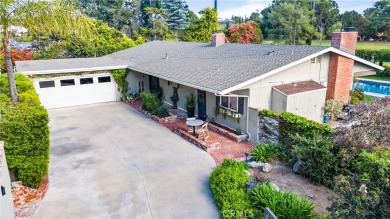 Nestled in a serene cul-de-sac adjacent to Yorba Linda Country on Yorba Linda Country Club in California - for sale on GolfHomes.com, golf home, golf lot