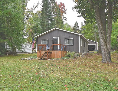 Enjoy up north living at its best in this highly sought after on Birch Pointe Golf Club in Michigan - for sale on GolfHomes.com, golf home, golf lot