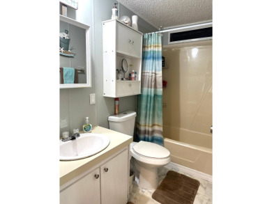 STEP INTO THIS BEAUTIFULLY UPDATED 2-BEDROOM 2-BATHROOM HOME! on Anglers Green Golf Course in Florida - for sale on GolfHomes.com, golf home, golf lot